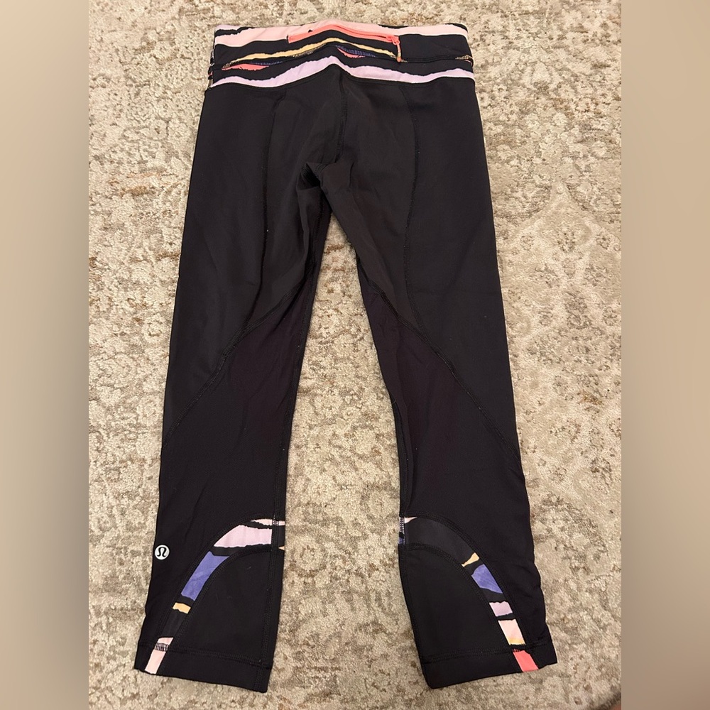 Lulu lemon black leggings with fun minimal design on band and bottom - Picture 2 of 4